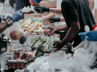 People sorting out food at a foodbank