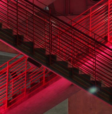 Image of red stairs in neon light