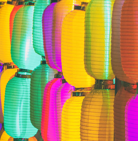Row of brighly coloured paper lanterns
